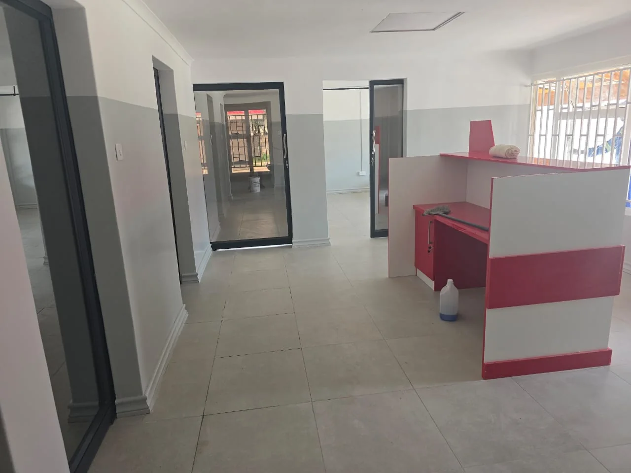 The refurbished Red Cross offices in Highfield, reception desk and glazed doors